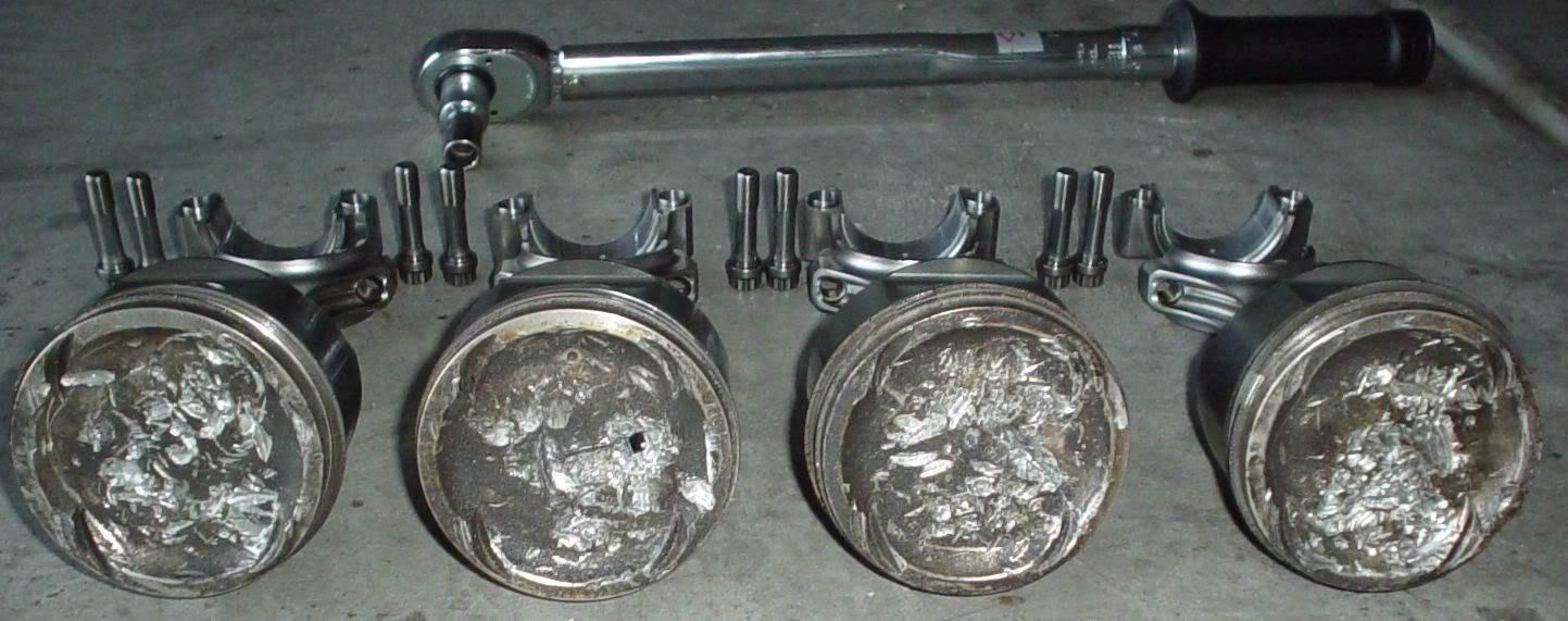 [RESOLVED] Piston hitting spark Plugs DSMtuners