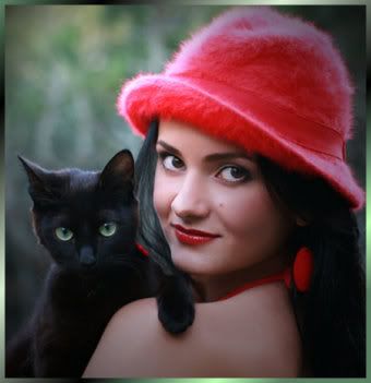 zwarte kat met dame met rode muts